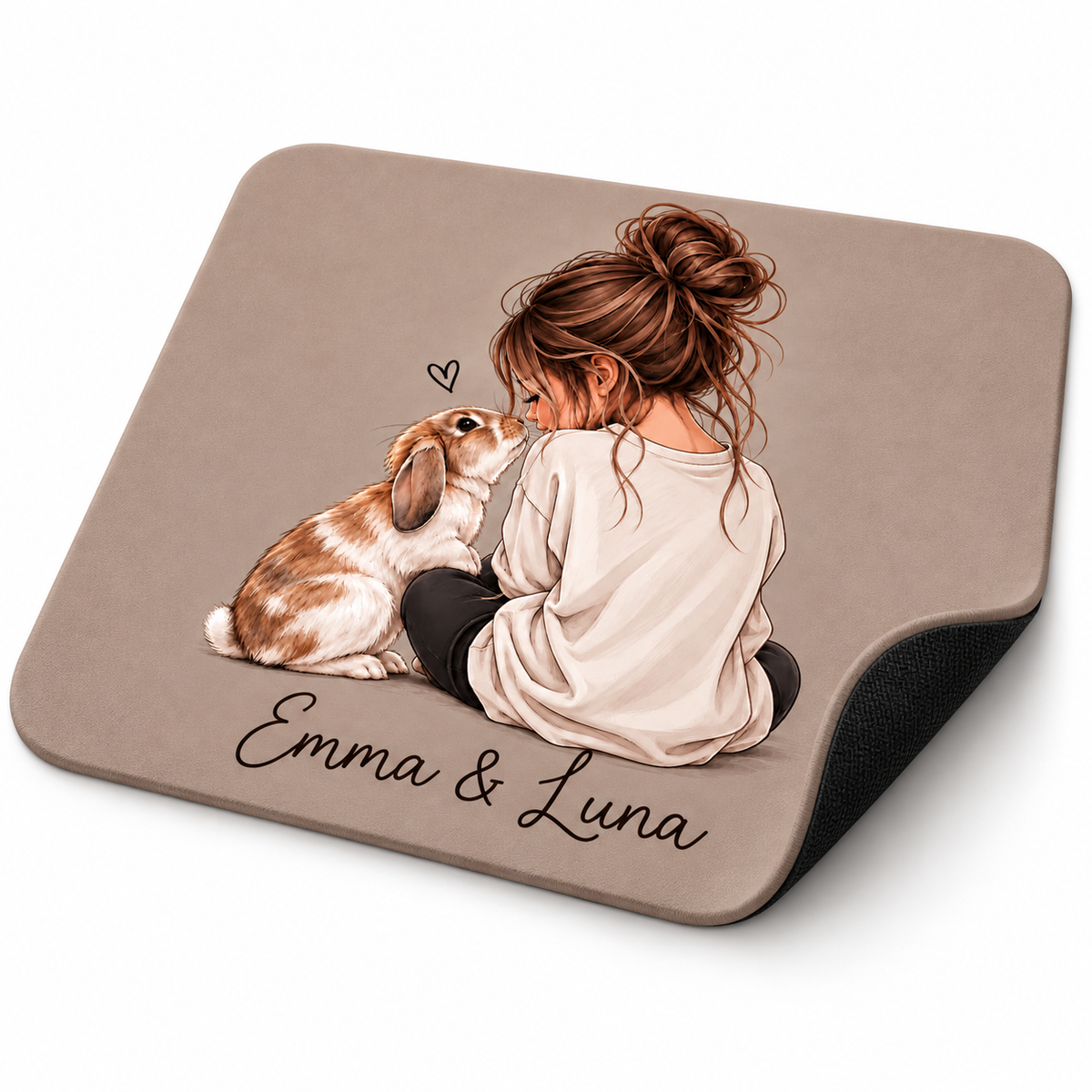Close-up of personalized mouse pad with soft fabric surface and black non-slip rubber base