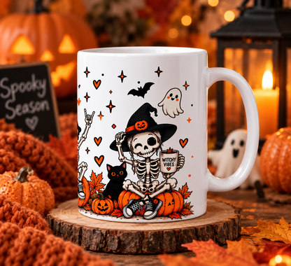 Spooky Vibes mug with witchy skeleton pumpkin and bat design